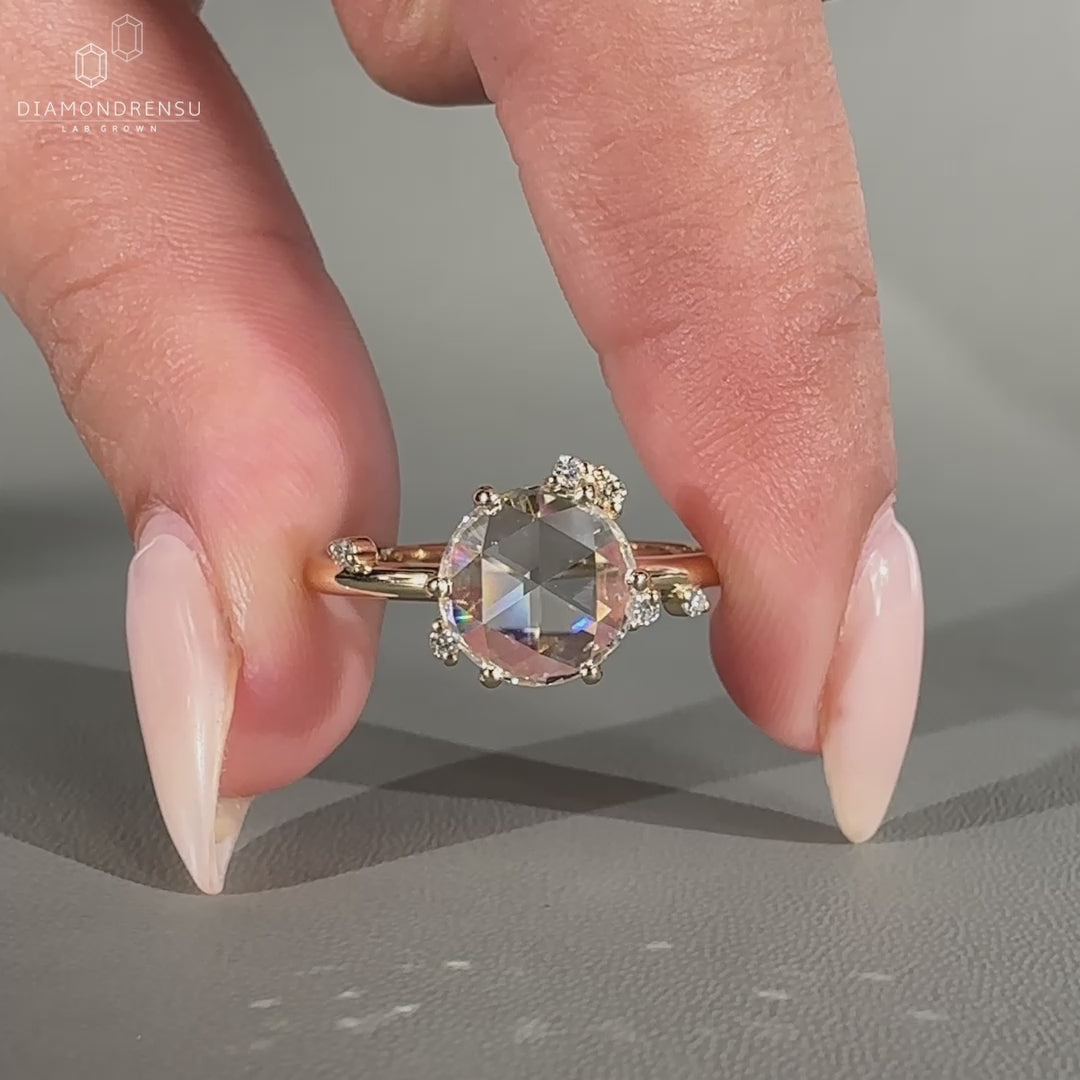 Yellow gold engagement ring with prong setting.