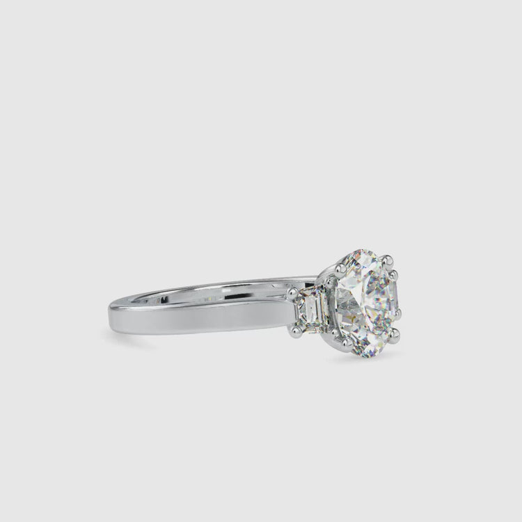 Diamondrensu UK ring with oval and side stone design.
