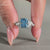 Cushion cut diamond ring with round and marquise side stones.
