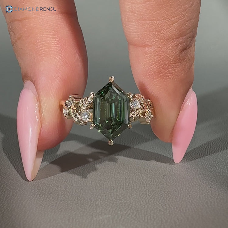 Handmade hexagon ring with round side stones.