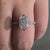 Diamondrensu UK engagement ring featuring a handmade elongated cushion diamond.