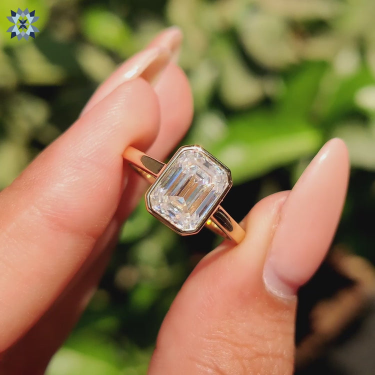 Emerald Cut ring with cathedral setting ring
