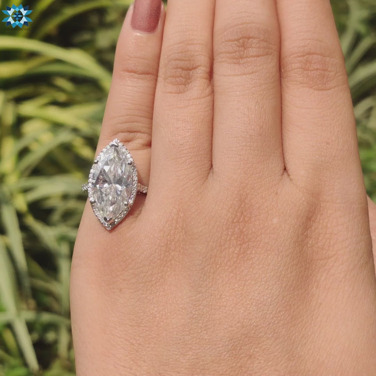 Buy moissanite ring featuring bridge and hidden accents.
