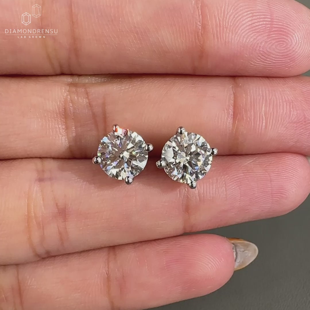White gold diamond stud earrings.
