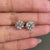 White gold diamond stud earrings.
