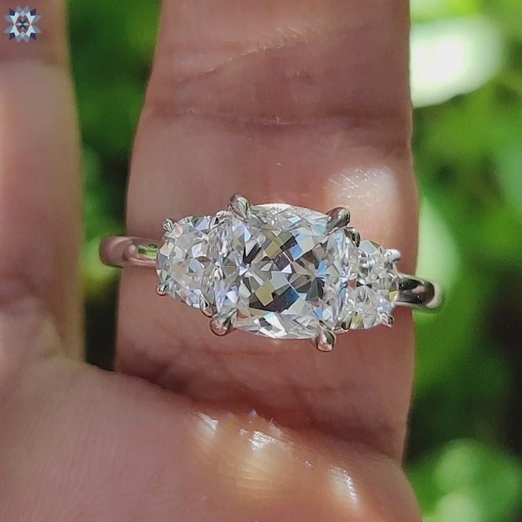 Custom engagement ring with unique three stone layout.
