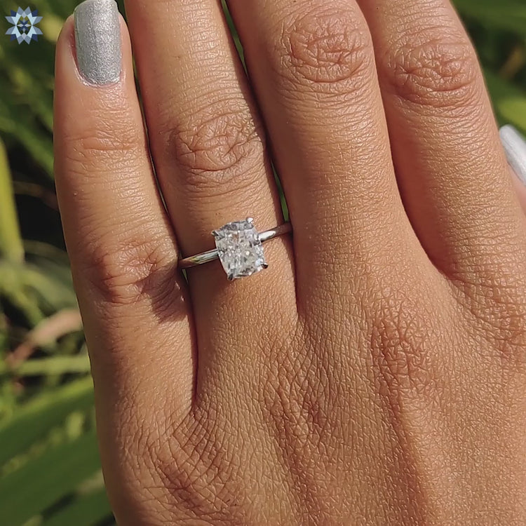 Custom moissanite ring with elongated cushion shape.
