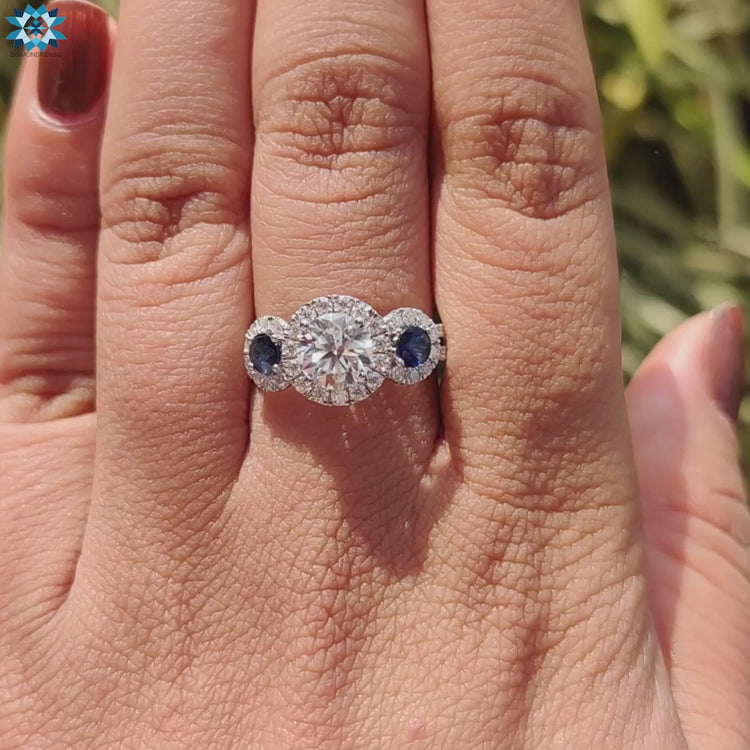 Custom engagement ring with moissanite center and blue sapphire.
