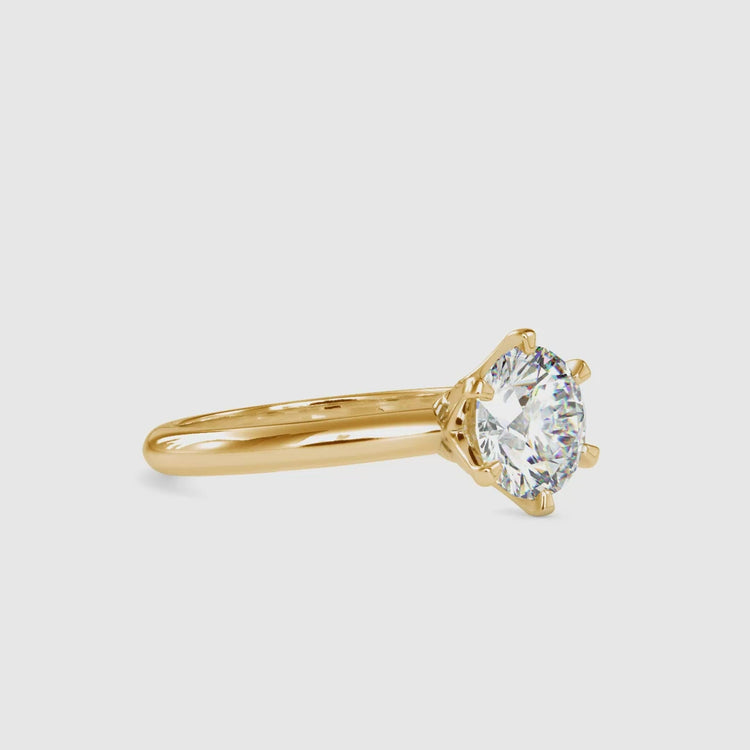 Diamondrensu UK ring in 6 prong solitaire style.
