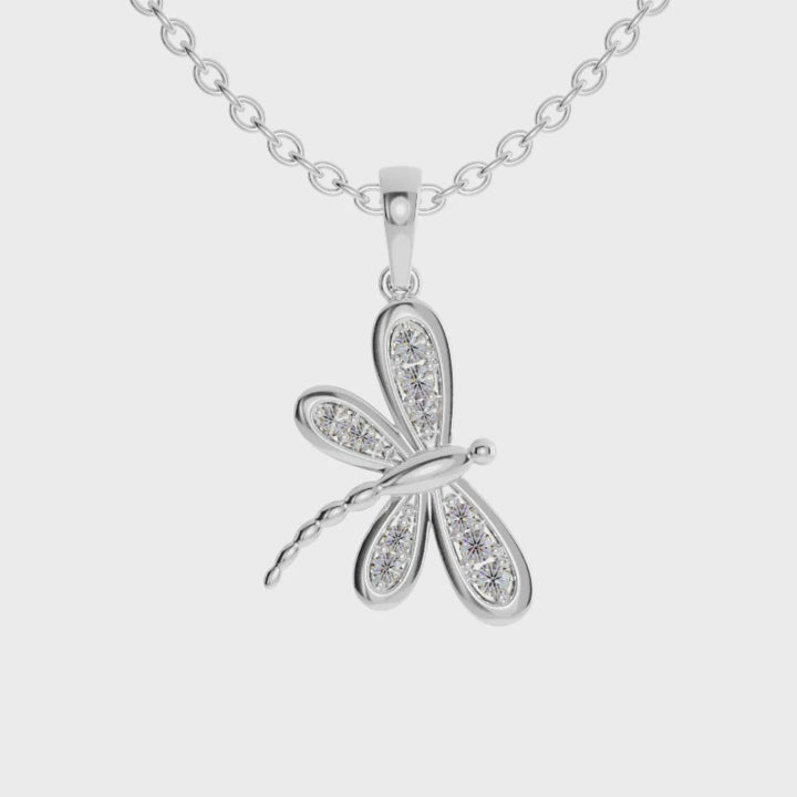 Prong set diamond pendant with butterfly wings in gold.