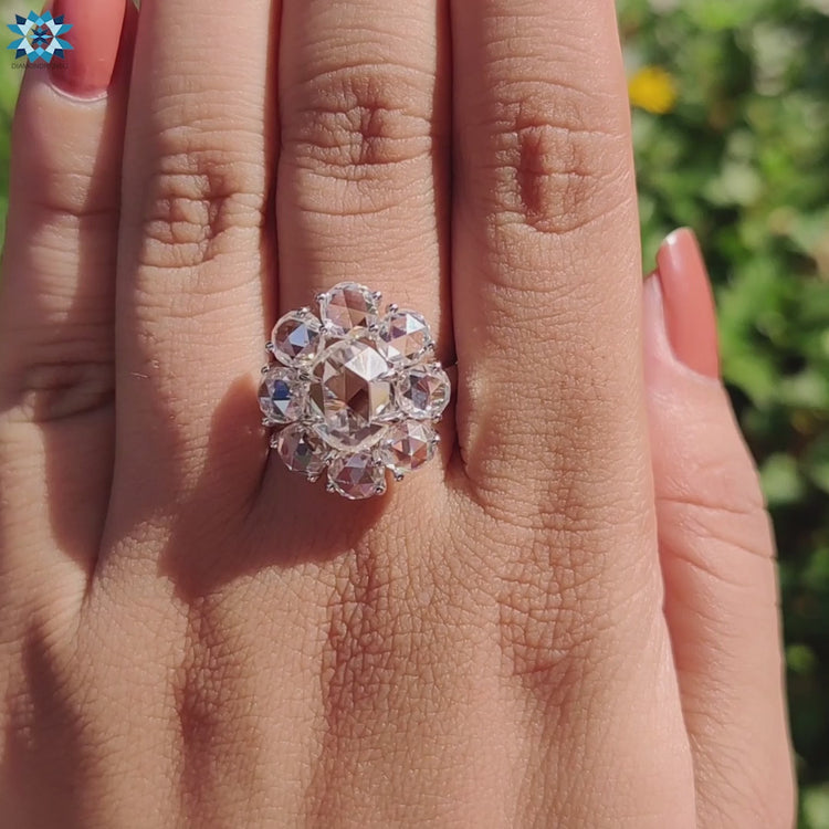 Handmade jewelry featuring rose cut moissanite in white gold.
