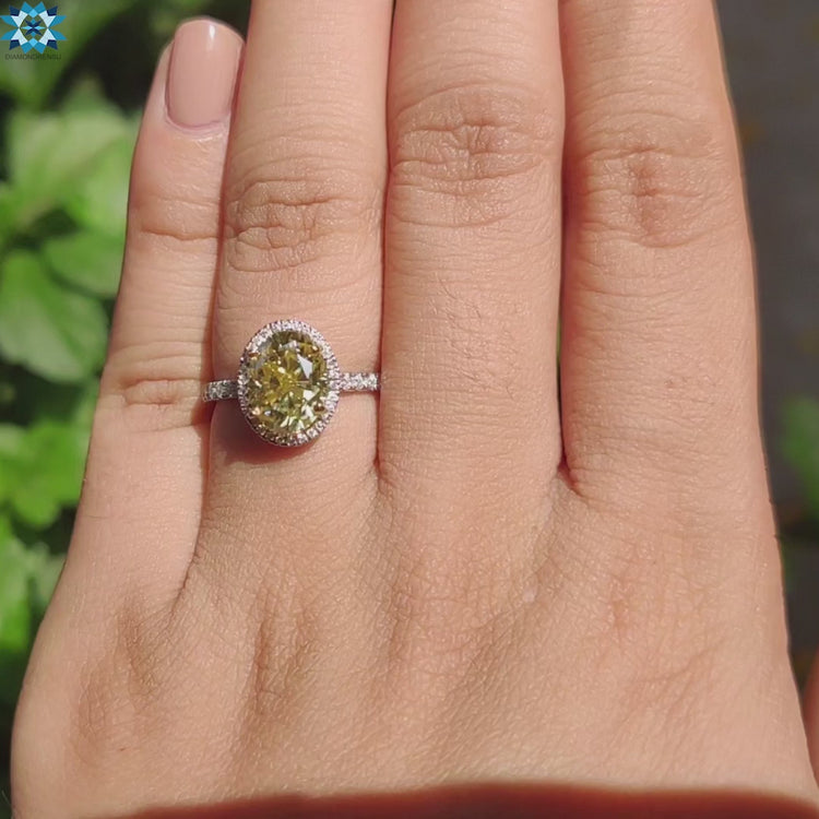 Diamondrensu UK custom oval cut moissanite engagement ring.
