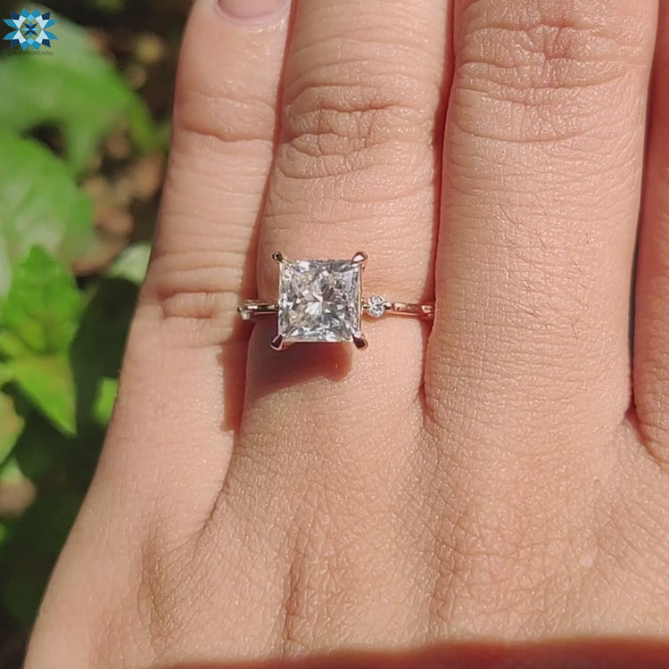 Handmade jewellery with princess cut center stone.

