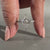 Handmade engagement ring featuring a round cut in a pavé setting.
