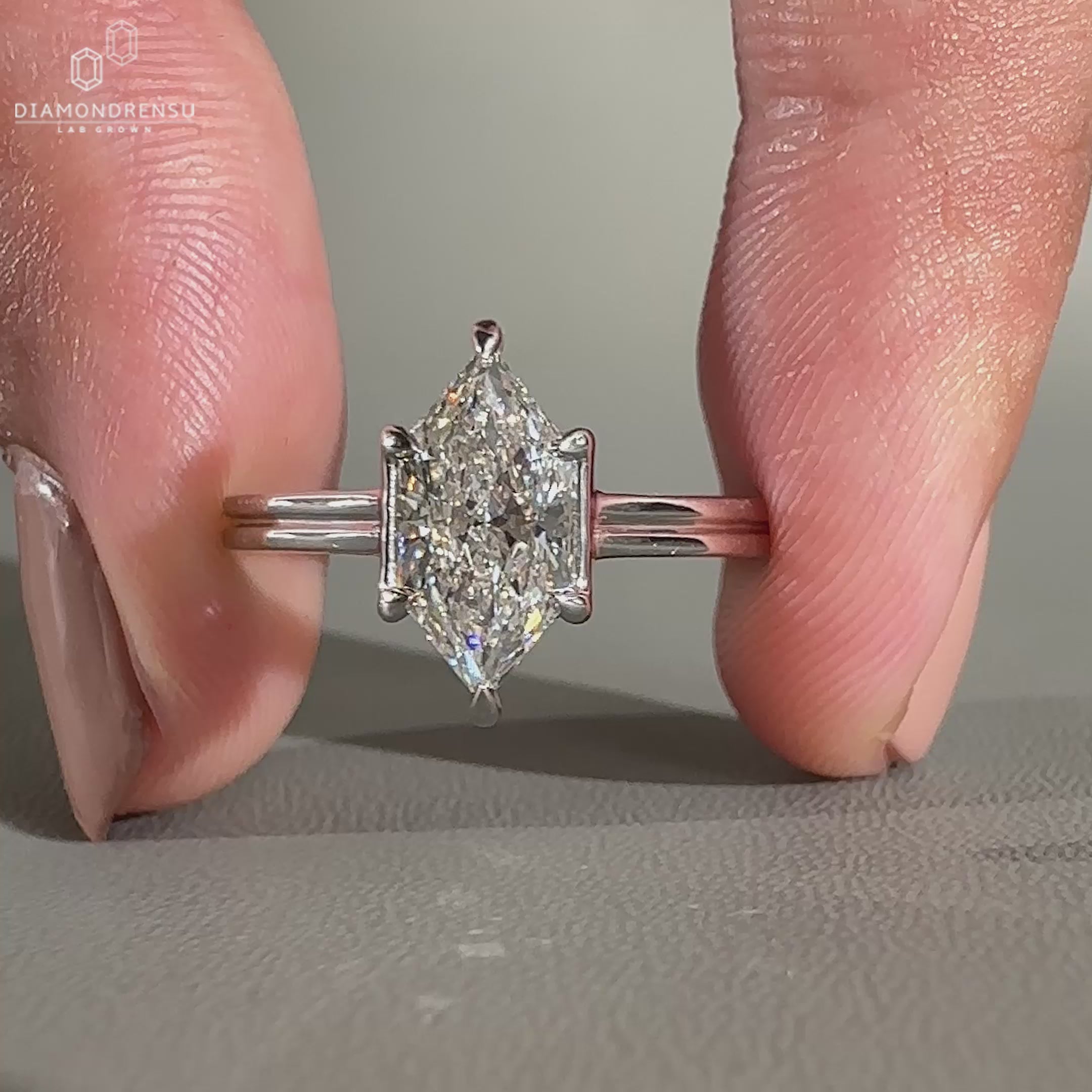 Dual shank setting paired with diamond solitaire ring.
