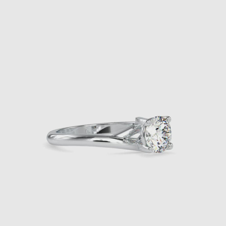 Lab grown diamond engagement ring in solitaire mount and round cut.
