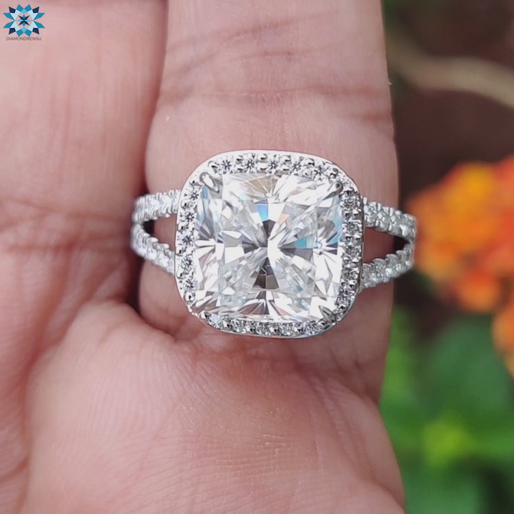Handmade jewelry featuring cushion halo moissanite center.
