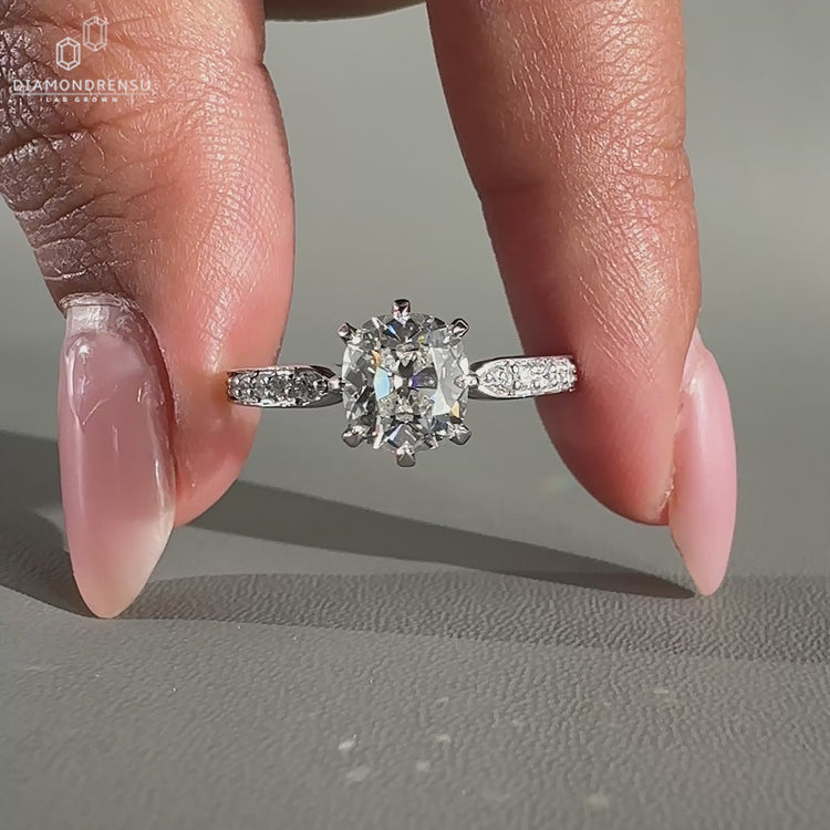 Cushion old mine cut ring in claw prong ring setting for UK engagement ring.
