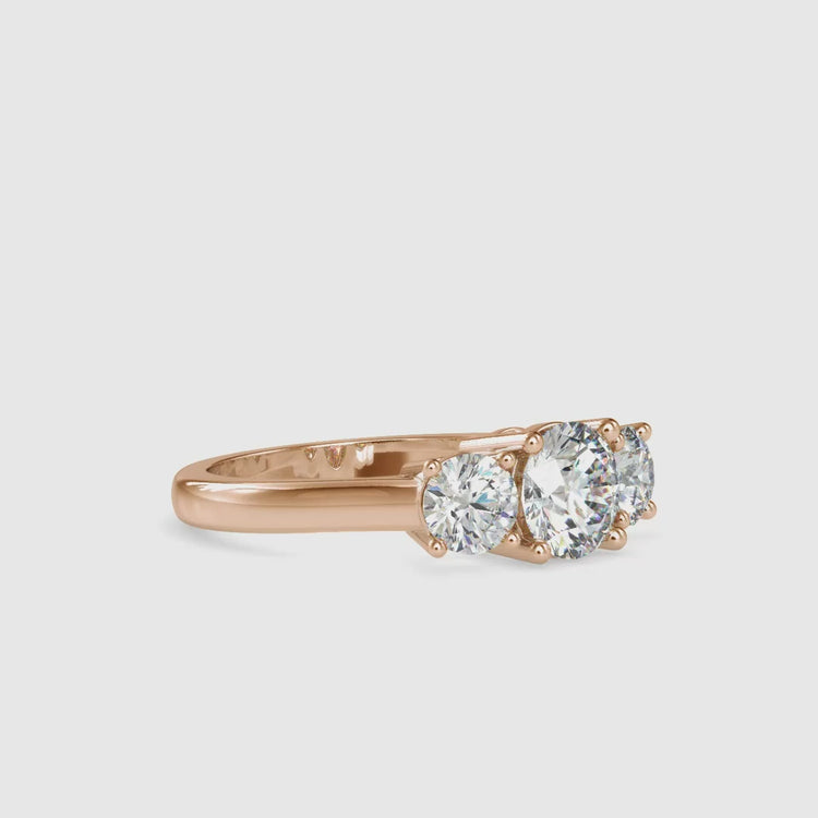 Handmade jewellery featuring three stone diamond engagement ring.