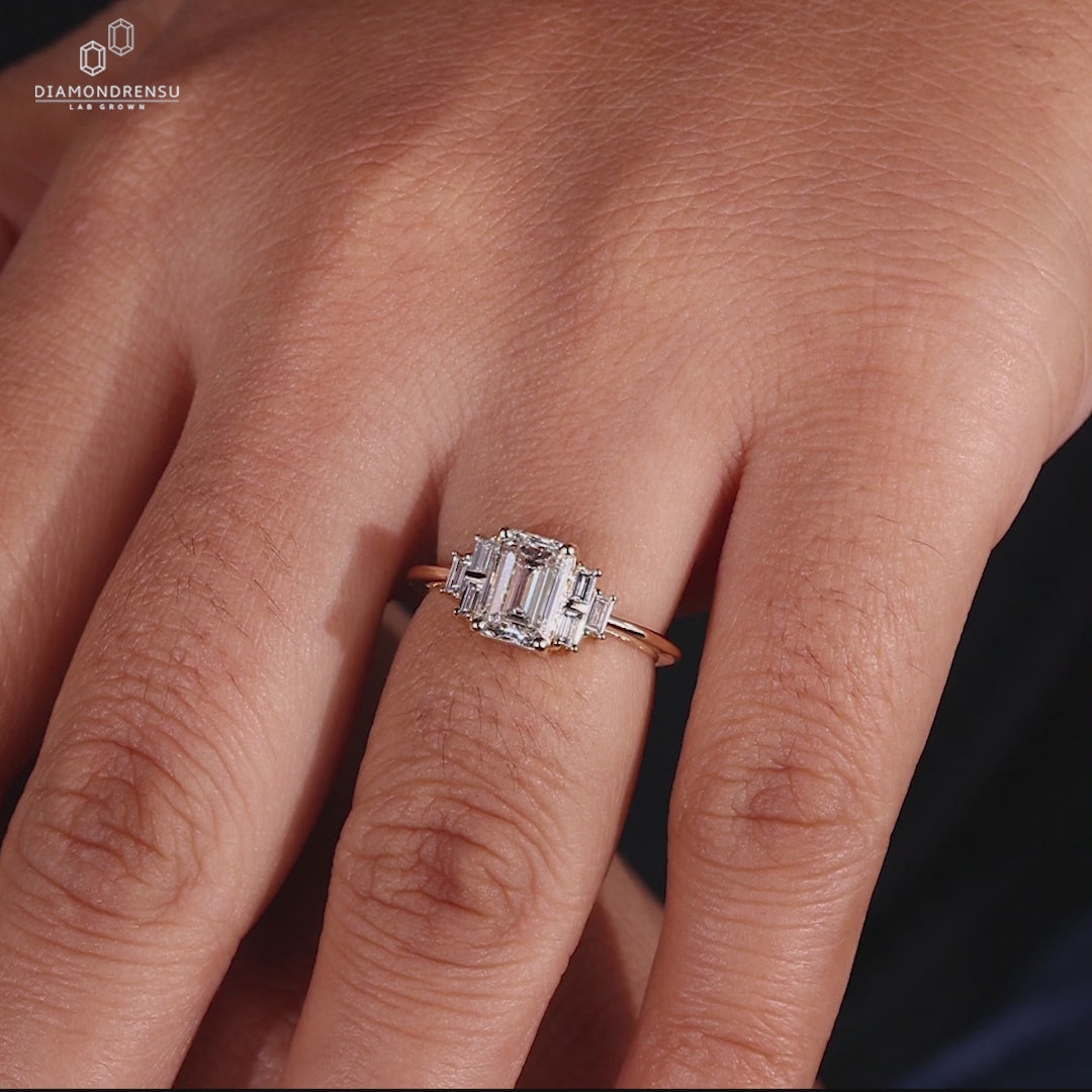 
Muse ring featuring baguette side stones.

