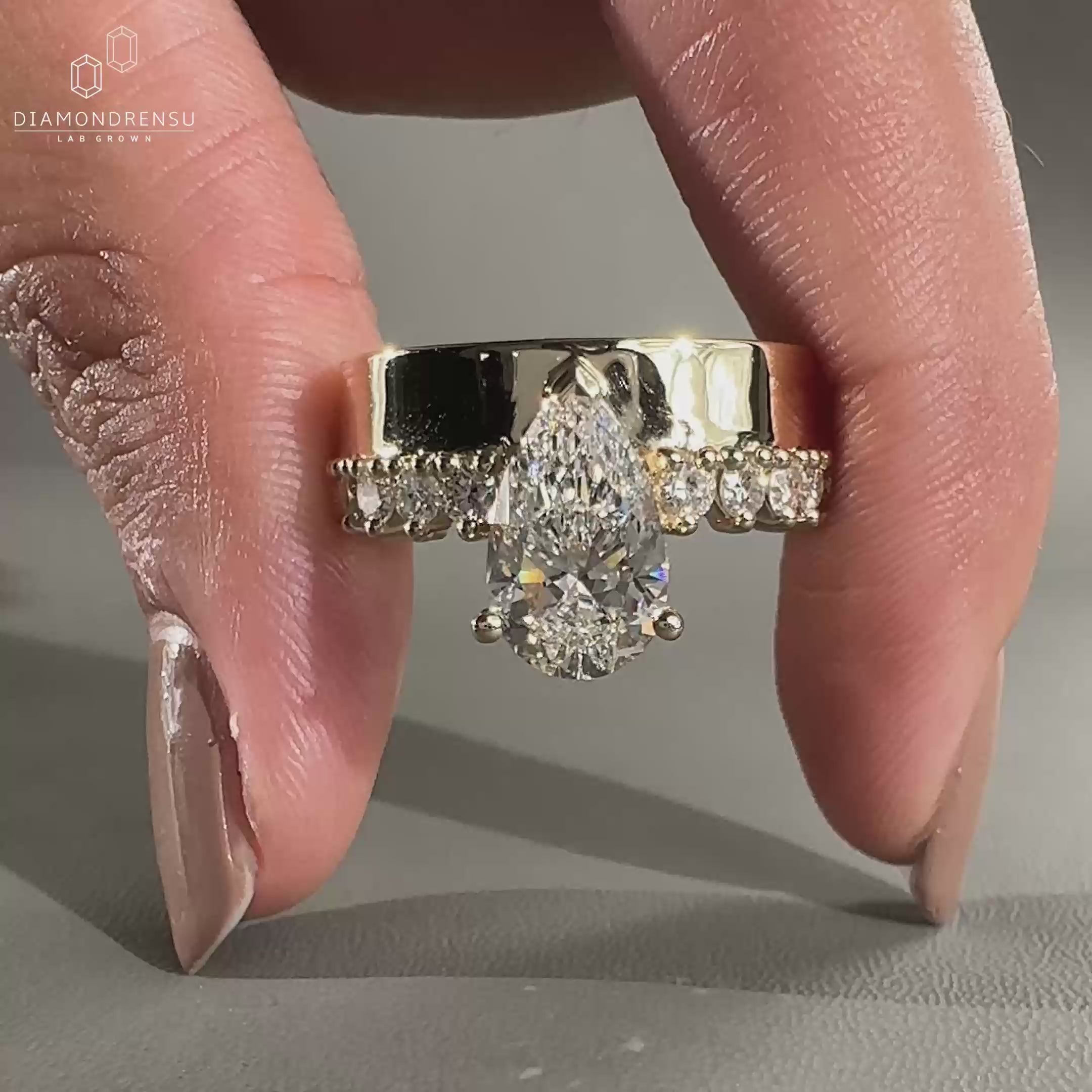 Pear Shaped Ring featuring pave setting ring
