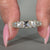 7 stone diamond band featuring lab grown diamonds in a prong setting.