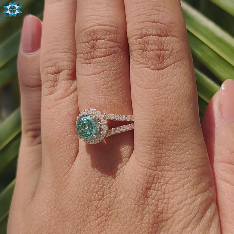 Round moissanite ring with split shank.
