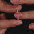 Yellow gold open gap wedding band with pave diamonds.
