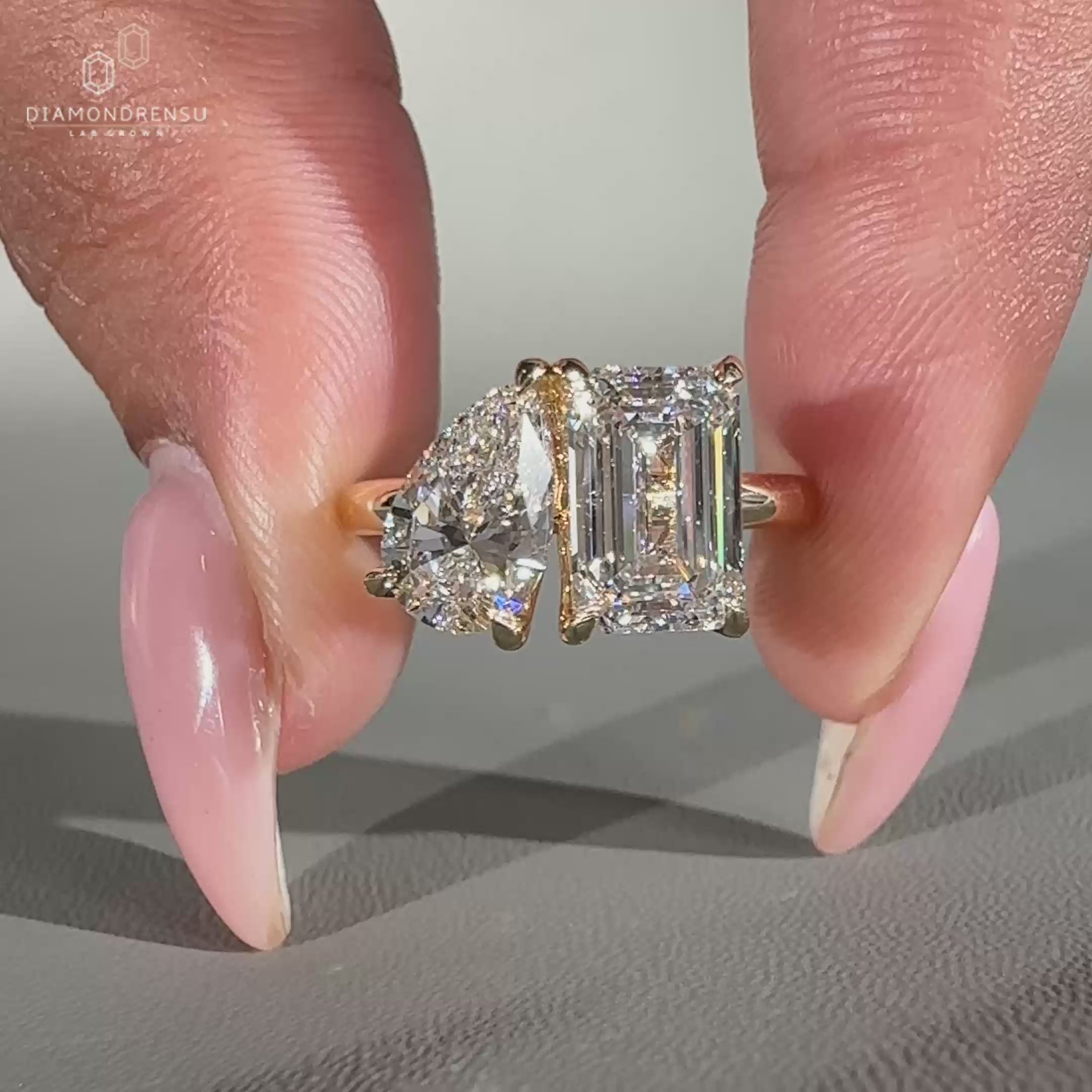 Two stone diamond engagement ring in yellow gold