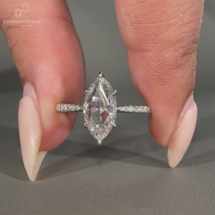 Marquise rose cut diamond ring in white gold.
