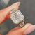 Trpezoid cut ring with bezel set engagement ring
