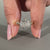 Round cut diamond ring featuring a solitaire design.
