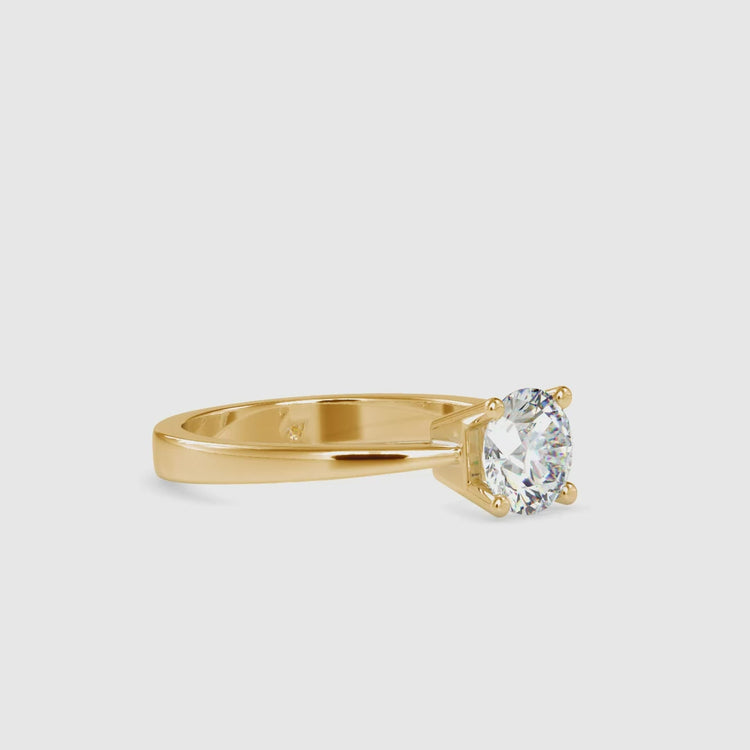 Diamondrensu UK engagement ring with round solitaire design.
