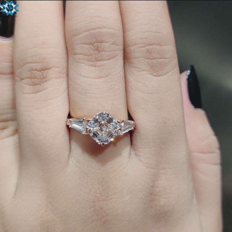 Handmade jewelry featuring a three stone design in rose gold.
