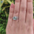 Elegant split shank ring with open pave details.