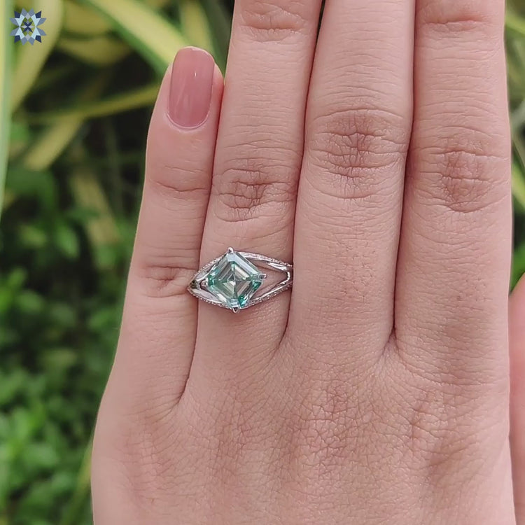 Elegant split shank ring with open pave details.
