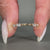 Marquise and baguette diamond band designed in a sleek shared prong setting.