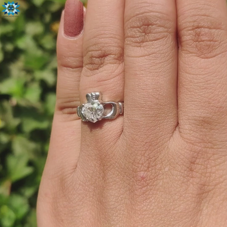 Custom moissanite engagement ring with heart shape.
