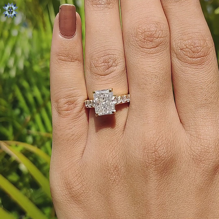 Custom pave setting ring with moissanite center.
