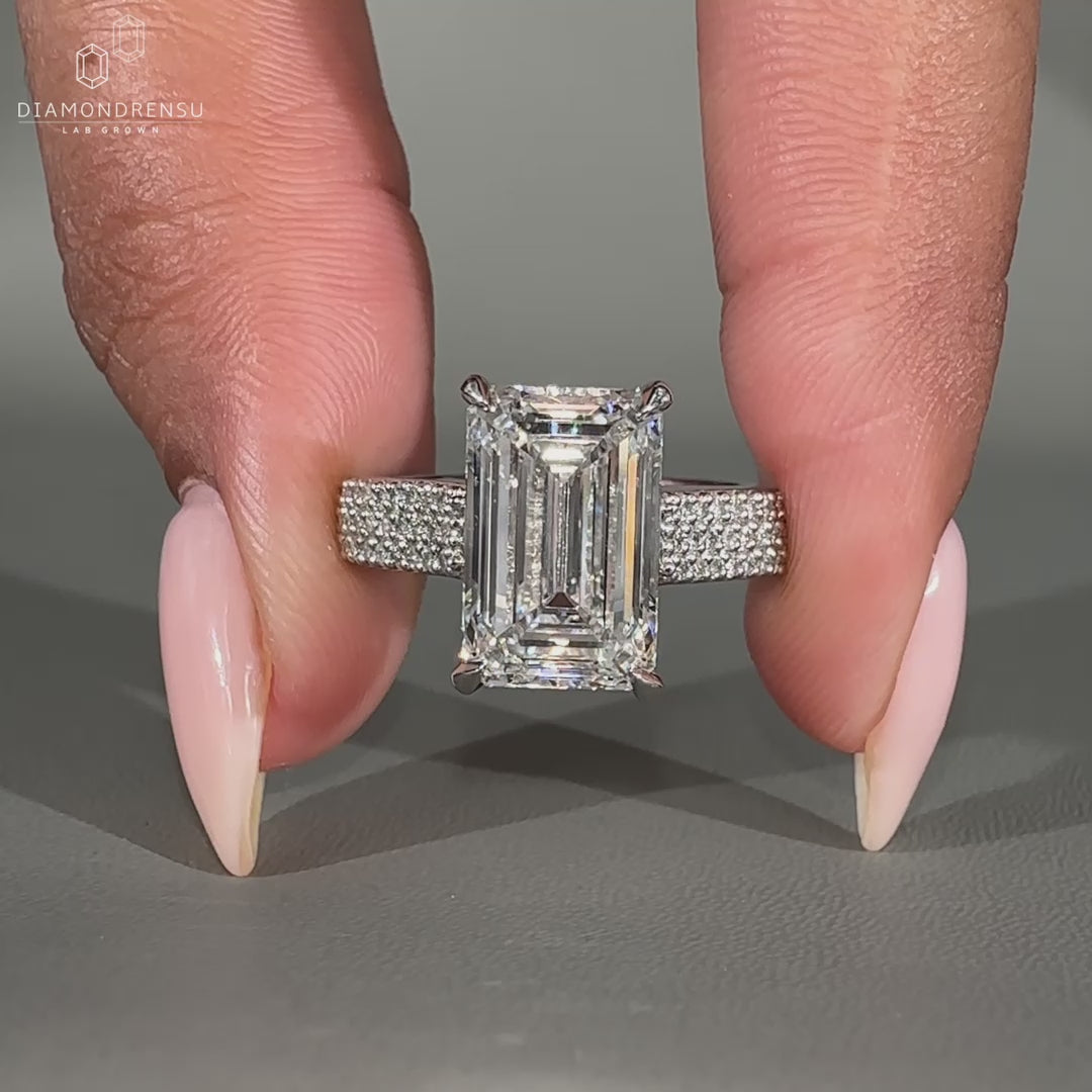 East west engagement ring with dual shank and two tone style.
