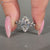 Handmade marquise ring with twisted shank design.