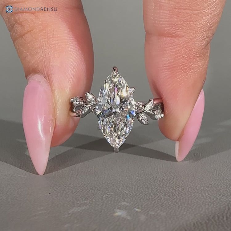 Handmade marquise ring with twisted shank design.