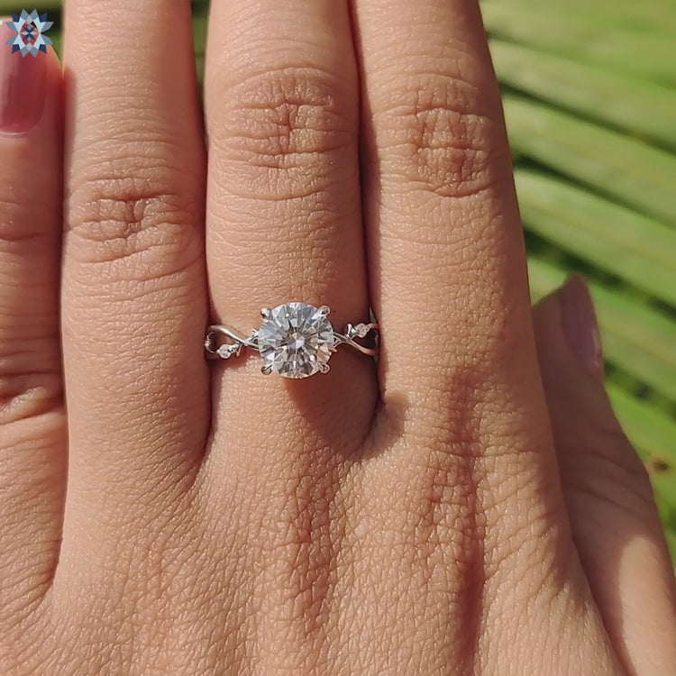 Round stone ring with 4 prongs.
