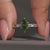 Green diamond ring with Art Deco style and engraved shank.