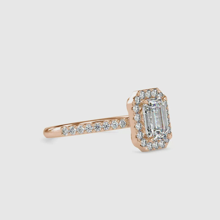 Diamondrensu UK ring with rose gold halo design.
