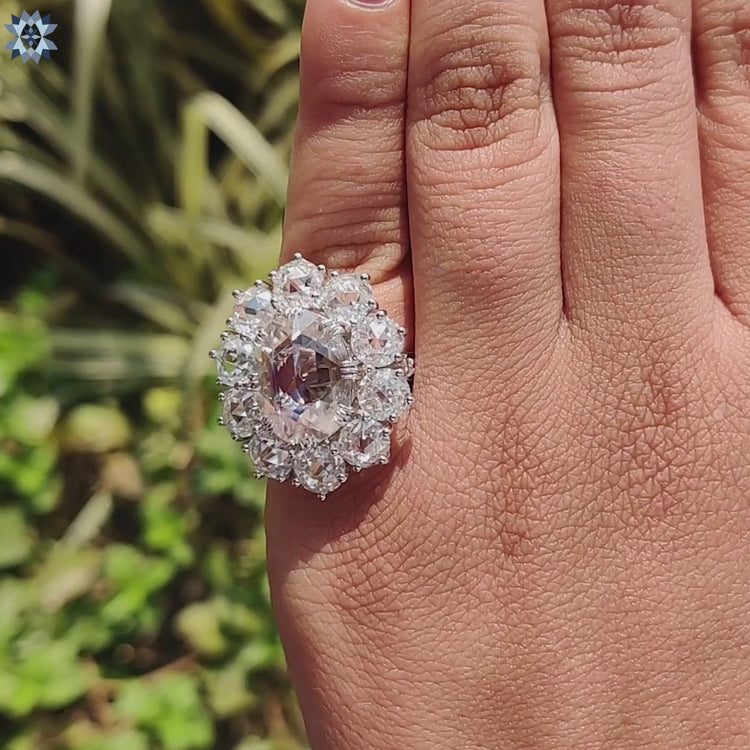Handmade jewellery featuring rose cut moissanite and fishtail prongs.
