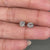 Handmade gold earrings featuring round diamond stud design.
