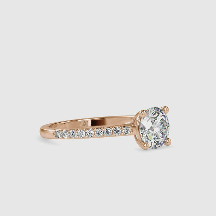 Custom engagement ring with IGI certified round cut diamond.