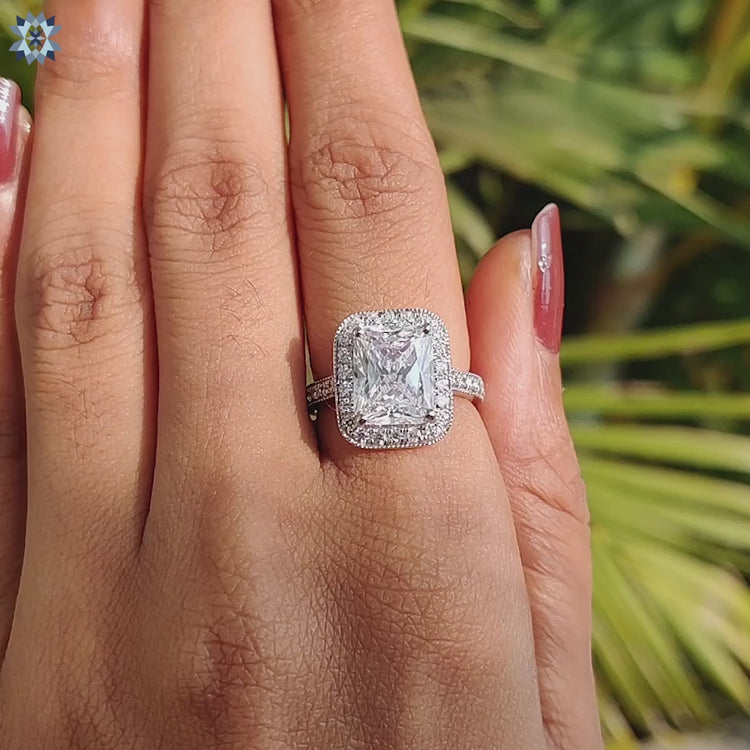 Moissanite ring with delicate 4 prong setting.

