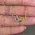 Yellow gold pendant crafted with emerald and pear cut Lab Grown Diamonds.
